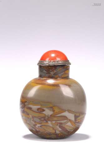 AN UNUSUAL PUDDINGSTONE CARVED SNUFF BOTTLE