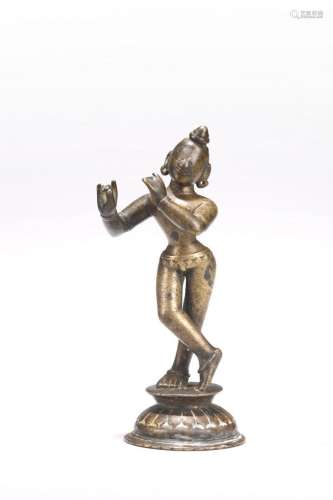 A COPPER ALLOY STANDING FIGURE OF DEITY