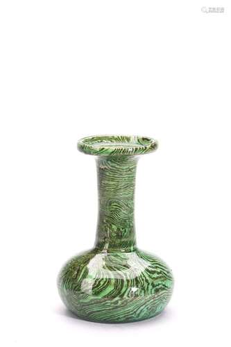 A CHINESE MARBLED GREEN GLAZE VASE