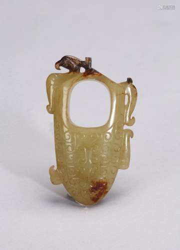 A YELLOW JADE ARCHAISTIC ORNAMENT