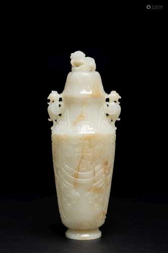 A LARGE WHITE JADE 'LONGEVITY' PHOENIX HANDLE VASE