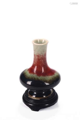 A SMALL CHINESE FLAMBE GLAZE VASE