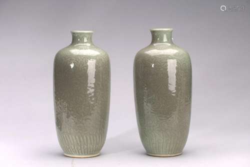 A PAIR OF CELADON CARVED 'LOTUS' LANTERN VASES