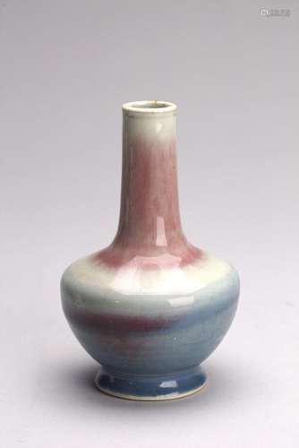 A CHINESE FLAMBE GLAZED BOTTLE VASE