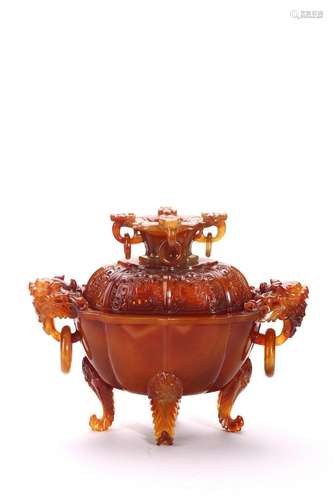 A RARE RED AGATE RETICULATED TRIPOD CENSER