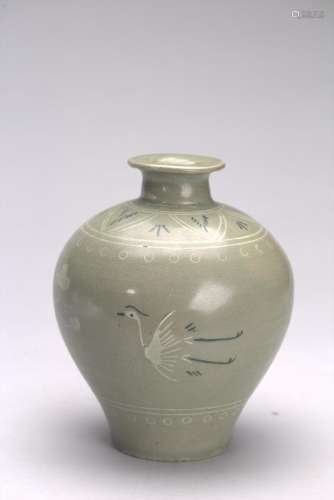 A KOREAN CELADON SLIP DECORATED 'CRANE' JAR