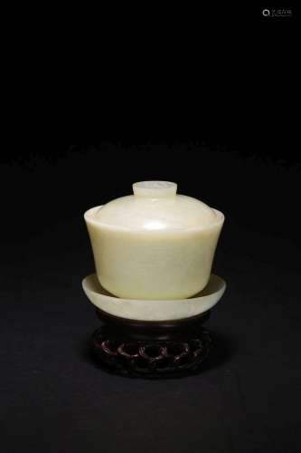 A CHINESE WHITE JADE BOWL AND STAND