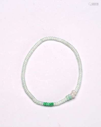 A NATURAL JADEITE BEADED NECKLACE