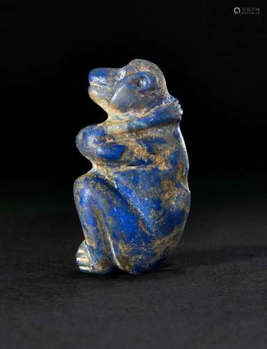 A LAPIS LAZULI BABOON AMULET, NEAR EASTERN, CIRCA 2ND-1ST MI...