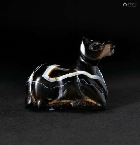 AN ELAMITE BANDED AGATE FIGURE OF A RECUMBENT HORSE, IRAN, C...