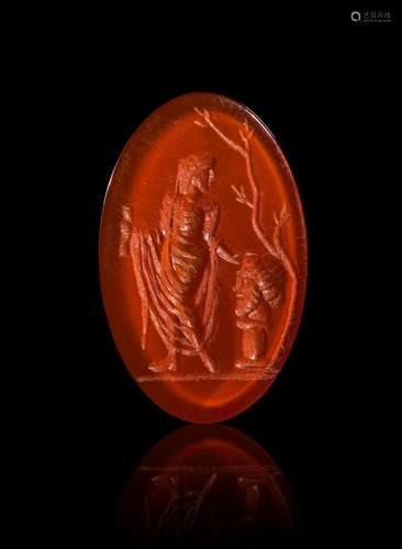 A GREEK CARNELIAN INTAGLIO OF A MAN AND A BUST HELLENISTIC P...