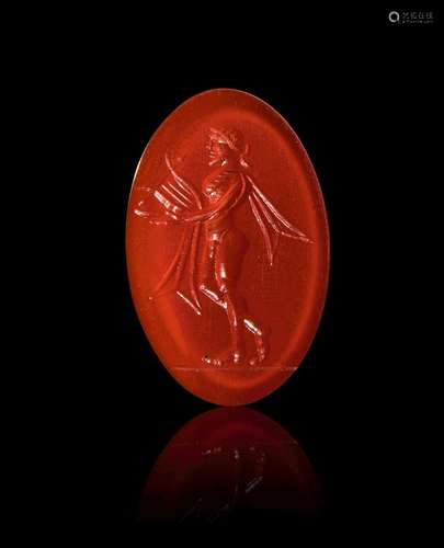 A ROMAN CARNELIAN INTAGLIO OF A STANDING MAN PLAYING THE LYR...