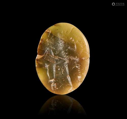 A ROMAN GREEN PLASMA INTAGLIO OF A CROWNED EMPEROR, CIRCA 2N...