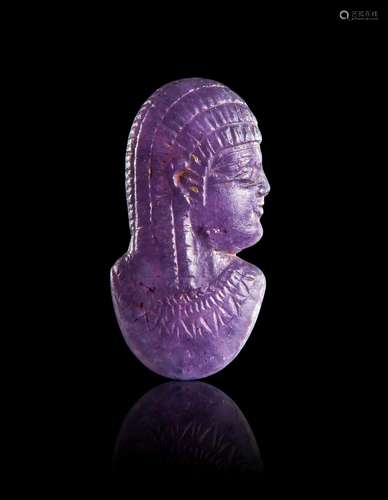 AN AMETHYST BUST OF A DEITY, LATE PERIOD TO PTOLEMAIC PERIOD...