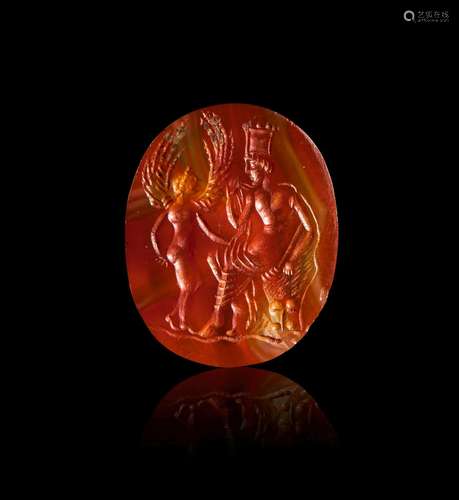 A ROMAN CARNELIAN INTAGLIO DEPICTING AN EMPEROR & A DEIT...