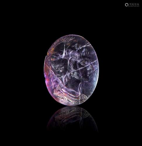 A RARE ROMAN AMETHYST CONJOINED INTAGLIO HEAD OF A WARRIOR &...