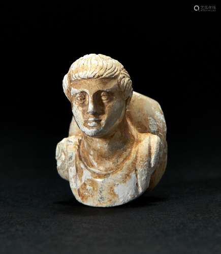 A ROMAN MARBLE FRAGMENT OF A BOY, CIRCA 2ND CENTURY A.D.