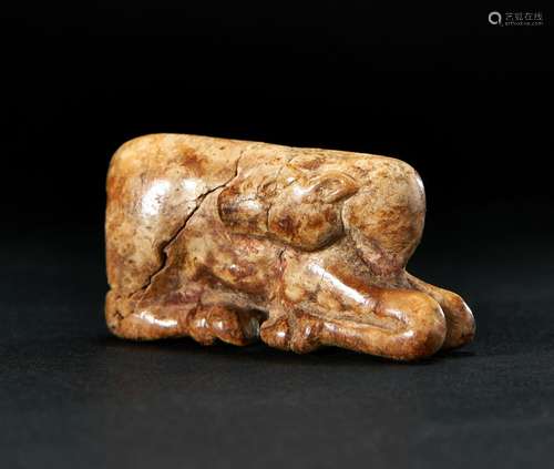 A BONE FIGURE OF A COW & A CUB, NEAR EASTERN, 8TH CENTUR...