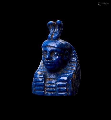 AN EGYPTIAN LAPIS LAZULI AMULET OF A PHAROH, PROBABLY LATE P...