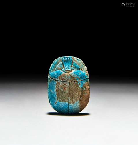 AN INSCRIBED EGYPTIAN TURQUOISE FAIENCE SCARAB PTOLEMAIC PER...