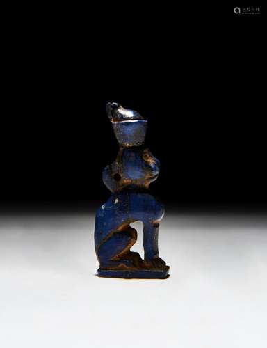 AN EGYPTIAN LAPIS LAZULI AMULET OF A CAT, LATE PERIOD-PTOLEM...