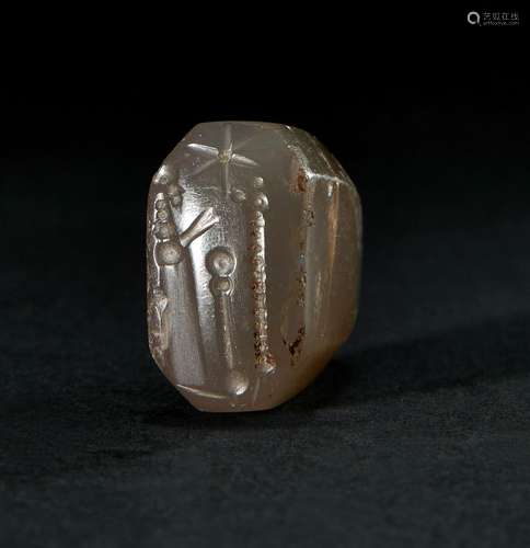 AN AGATE BABYLONIAN STAMP SEAL DEPICTING A RULER, CIRCA 2ND ...