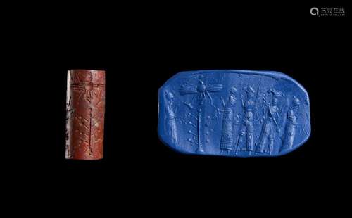 A JASPER ACHAEMENID CYLINDER SEAL DEPICTING A CEREMONIAL SCE...