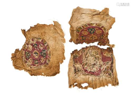 THREE COPTIC "POMEGRANATE" TEXTILE FRAGMENTS CIRCA...