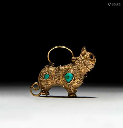 A FATIMID GOLD EARRING IN THE FORM OF A LION, CIRCA 10TH CEN...