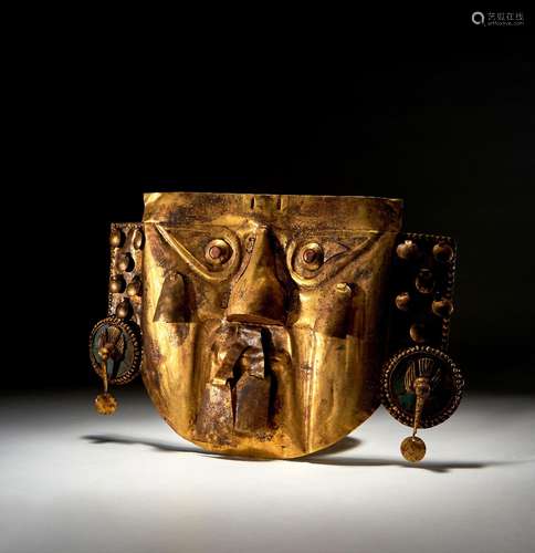 A GOLD SICAN LAMBAYEQUE FUNERARY MASK WITH HANGING DANGLINGS...