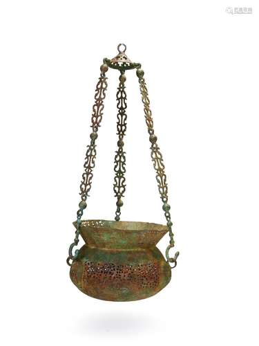 A HANGING BRONZE SILVER INLAID MOSQUE LAMP, ABBASID CIRCA 10...