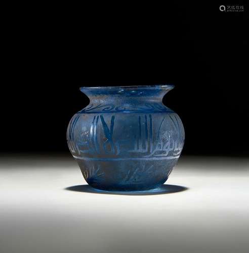 A KUFIC INSCRIBED BLUE GLASS POT, PROBABLY 9TH-11TH CENTURY ...