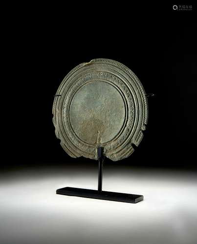 A GREY SCHIST CARVED MIRROR, GANDHARA, CIRCA 5TH CENTURY CE