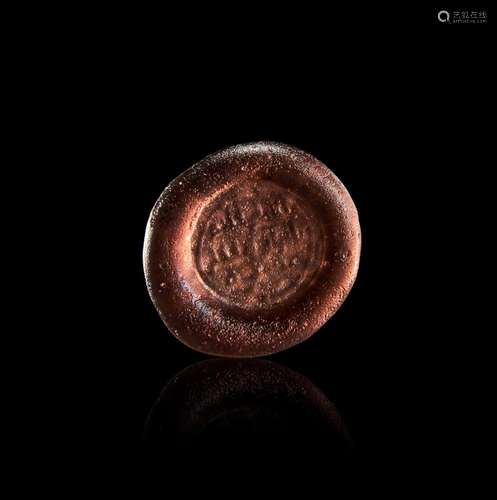 AN ISLAMIC GLASS SEAL