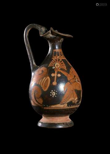 A GREEK APULIAN RED FIGURE TREFOIL OINOCHOE, DEPICTING A SEA...