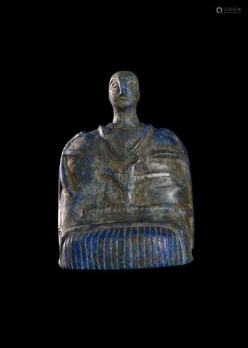 A BACTRIAN COMPOSITE LAPIS LAZULI SEATED PRINCESS