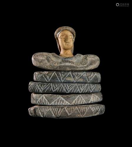 A BACTRIAN STONE SEATED PRINCESS IDOL