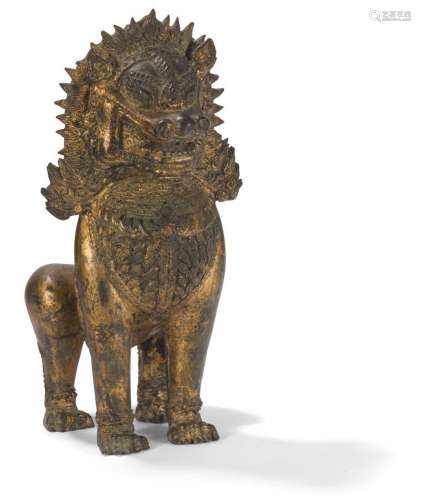 Lion en bronze laqué or<br />
Thaïlande, début du XXe siècle...