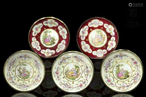 Set of decorative plates, with frame, 20th century