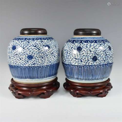 CHINESE PAIR QING BLUE AND WHITE JARS WITH WOODEN LID AND ST...