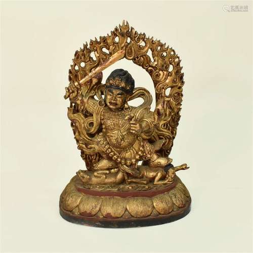 A LARGE SINO-TIBETAN GILT AND POLYCHROME LACQUERED CARVED WO...