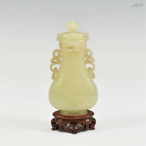 CHINESE YELLOW JADE LIDDED VASE WITH WOOD STAND