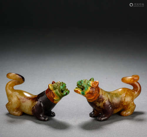 Two pieces of Hetian jade inlaid with turquoise beasts befor...