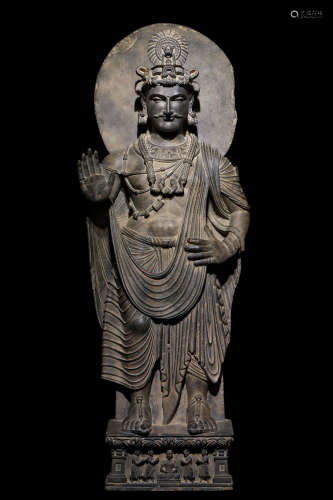 Gandhara. Gray schist stone standing Buddha