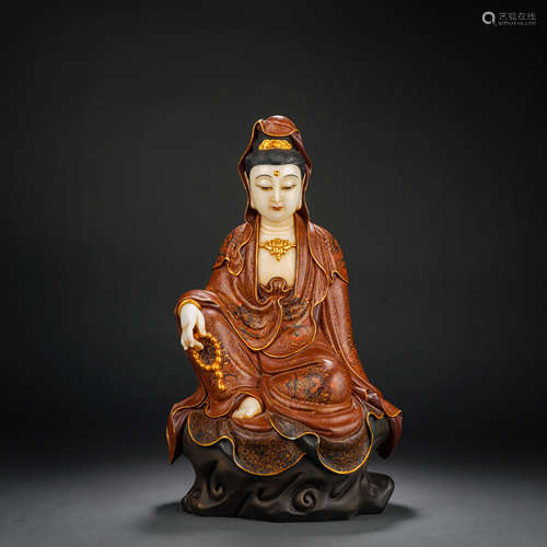 A Seated Statue of Avalokitesvara with Gold Paste and Painte...