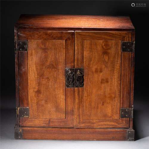 A WOODEN CABINET
