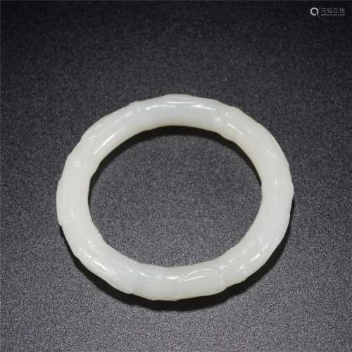 A CHINESE CARVED WHITE JADE BAMBOO BANGLE