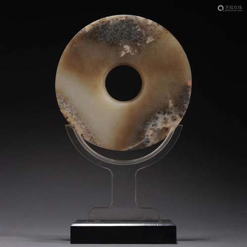 A CHINESE CIRCULAR JADE DISC BI