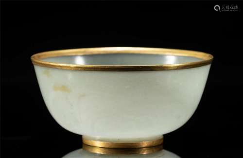 A CHINESE CARVED JADE BOWL
