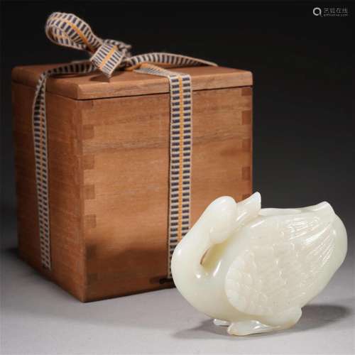 A CHINESE CARVED WHITE JADE GOOSE